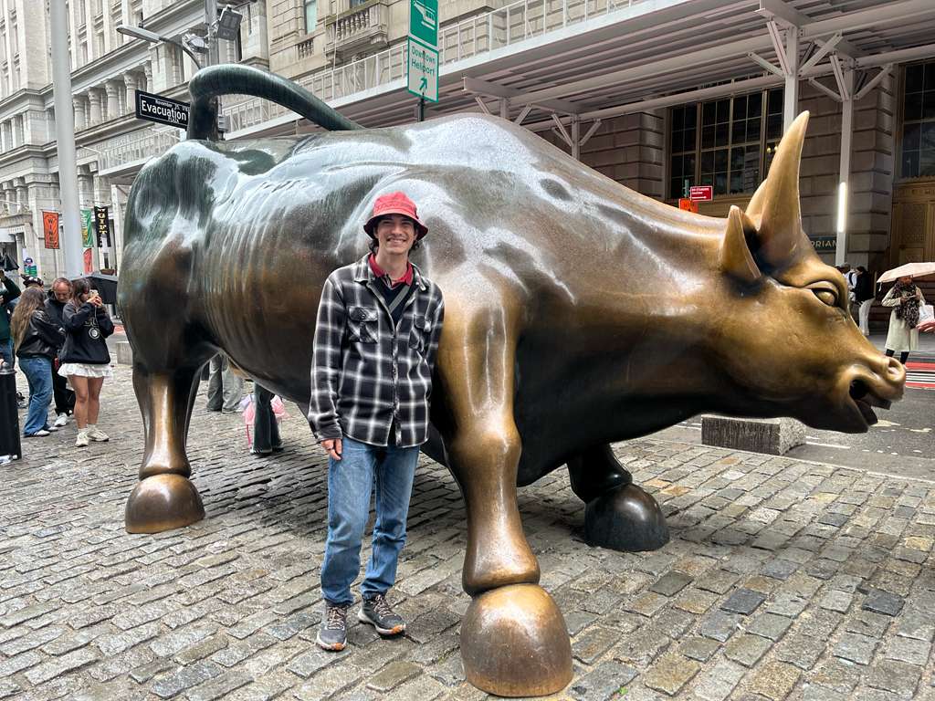 Me in front of a bull statue